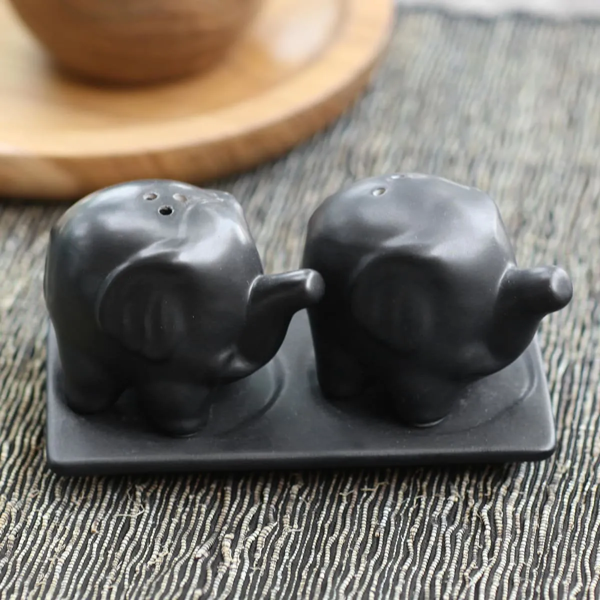 Novica Eager Elephants In Black Ceramic Salt And Pepper Set